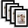 Hongkee 7x10 Picture Frame Set of 4, Made of Real Glass and Black Frame - Display 5.5 x 8.5 Diploma Frame with Mat or 7x10 Without Mat, 7 by 10 Photo for Wall or Tabletop