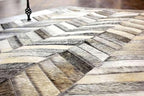 Chevron Pattern Faux Cowhide Area Rug | Non-Slip Leather Carpet for Living Room, Bedroom, and Office | Modern Designer Rug for Home Décor(3x8 ft_Grey)