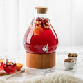 Classic Home Teardrop Clear Glass Ice Cold Beverage Drink Dispenser- 2.75 Gallon, With Cork Lid & Modern Wood Base Leak Proof Spigot- Wide Mouth Easy Filling For Outdoor, Parties & Daily Use