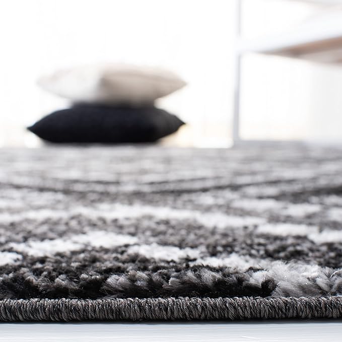 SAFAVIEH Adirondack Collection Area Rug - 5'1" x 7'6", Black & Ivory, Modern Diamond Distressed Design, Non-Shedding & Easy Care, Ideal for High Traffic Areas in Living Room, Bedroom (ADR131A)