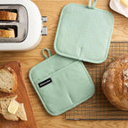 KITCHENAID Gourmet Series Gridlines Pot Holders 2-Pack Set, Heat Resistant up to 600°F, Soft Silicone Grip, Magnetic Cuff, Pistachio Green, 8"x8"