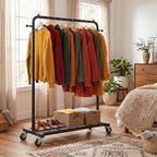 Sywhitta Clothing Rack on Wheels with Mesh Storage Shelf & Sturdy Metal Frame, Rolling Garment Rack for Hanging Clothes, Coats, Skirts, 39.76" L x 16" W x 64.56" H,Black